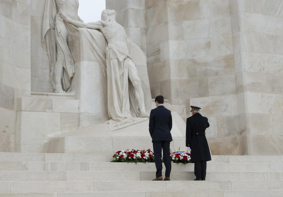 Canadian Prime Minister Justin Trudeau pauses as he lays a wreath on the Canadian National Vimy Memorial Saturday, Nov. 10, 2018 at Vimy Ridge, France. (Adrian Wyld/The Canadian Press via AP)