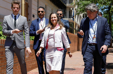 Canadian Foreign Affairs Minister Chrystia Freeland is trailed by reporters as she departs her meeting with U.S. Trade Representative Robert Lighthizer in Washington, U.S., May 15, 2019. REUTERS/Kevin Lamarque