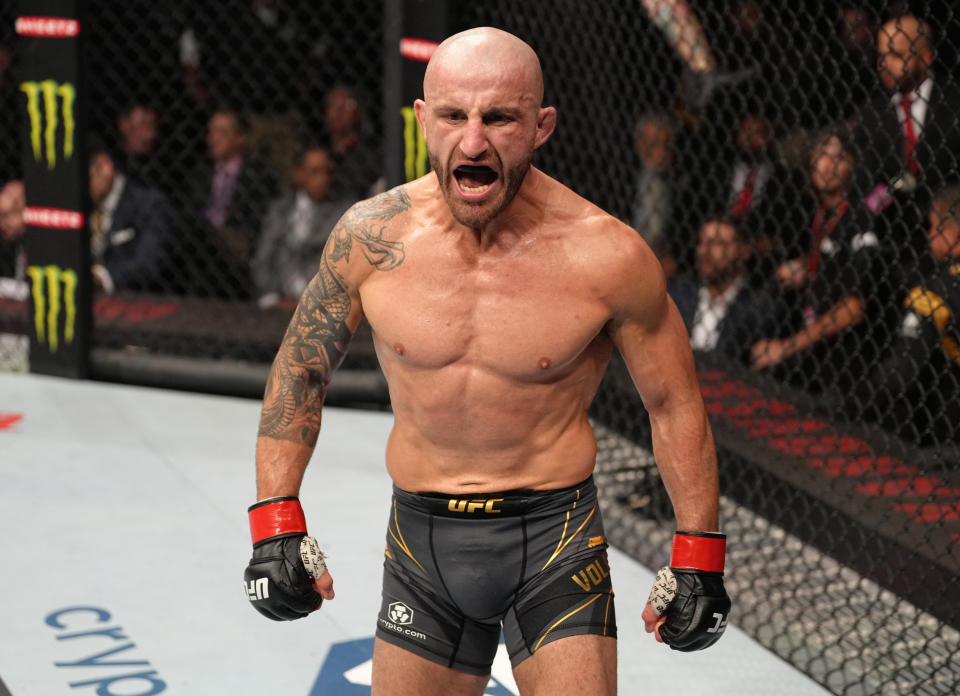 JACKSONVILLE, FLORIDA - APRIL 09: Alexander Volkanovski of Australia celebrates after his victory over 'The Korean Zombie' Chan Sung Jung of South Korea in their UFC featherweight championship fight during the UFC 273 event at VyStar Veterans Memorial Arena on April 09, 2022 in Jacksonville, Florida. (Photo by Jeff Bottari/Zuffa LLC)