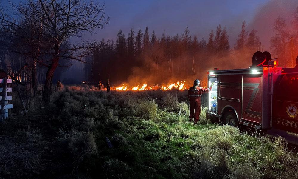 <span>Photograph: Alberta Wildfire Handout/EPA</span>