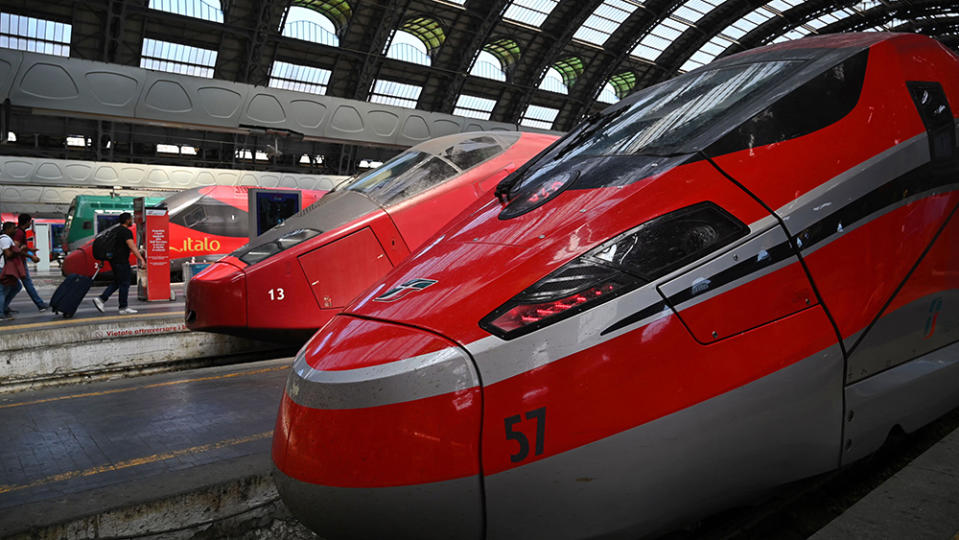 This photograph taken on July 7, 2023 shows a Freccia Rossa (Red Arrow) high-speed train of Trenitalia train operator at the central railway station in Milan. (Photo by GABRIEL BOUYS / AFP) (Photo by GABRIEL BOUYS/AFP via Getty Images)