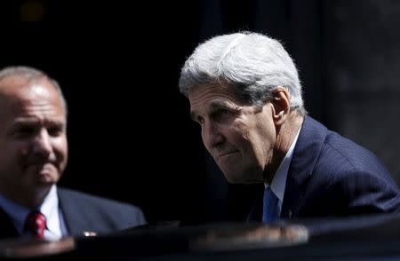 U.S. Secretary of State John Kerry leaves Stephen's Cathedral after attending a mass in Vienna, Austria July 12, 2015. REUTERS/Carlos Barria