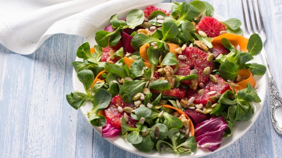 Sunflower seeds in a bowl of salad, which benefits females