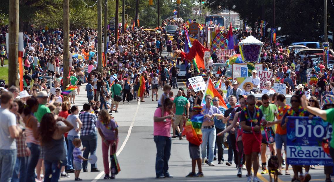 Thousands line Main Street during the annual Pride Parade in Durham, N.C. in 2014. The parade’s roots started June 27, 1981, when about 300 people marched through downtown Durham holding banners and signs for “Our Day Out,” a demonstration for gay and lesbian rights.