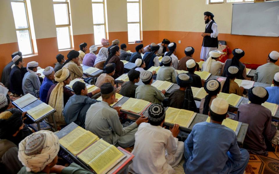 Male students attend classes as Taliban hardliners continue to block the return to school for girls in Afghanistan - Javed Tanveer/AFP via Getty Images 