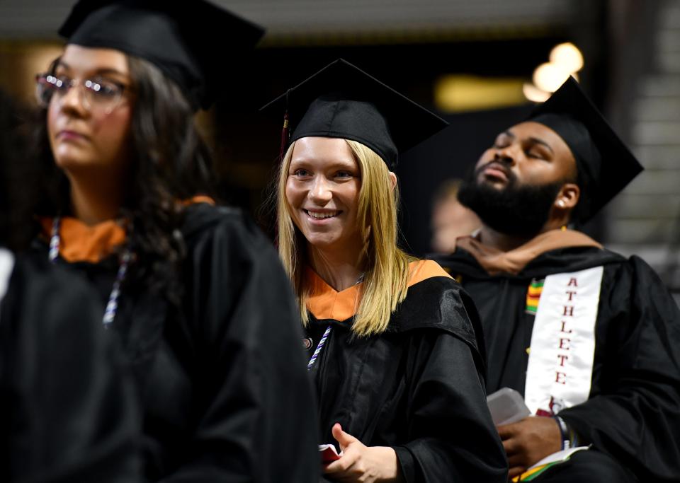 Hannah Lawson of Dudley is all smiles during Anna Maria College's 74th commencement exercises at the DCU Center Monday.