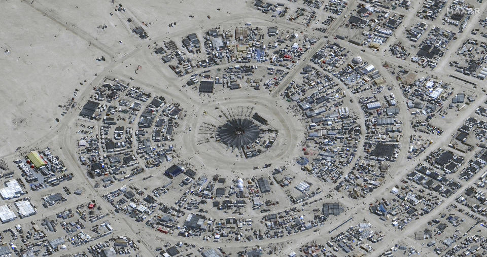 In this satellite photo provided by Maxar Technologies, an overview of Burning Man festival in Black Rock, Nev on Monday, Aug. 28, 2023. (©2023 Maxar Technologies via AP)