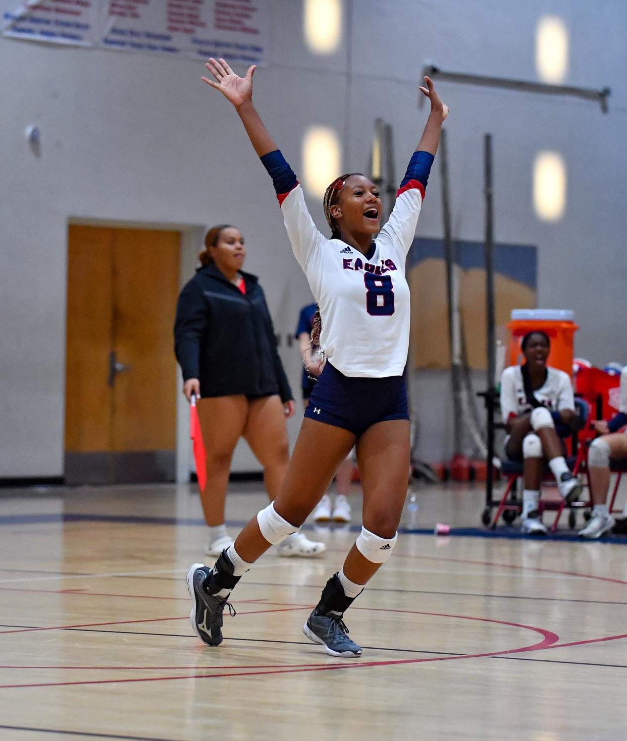 St. Lucie West Centennial's Luyeisy Marquez-Moreno (8) celebrates a point in a volleyball match against Martin County on Tuesday, Aug. 22, 2023, in Port St. Lucie. Centennial won in five sets.