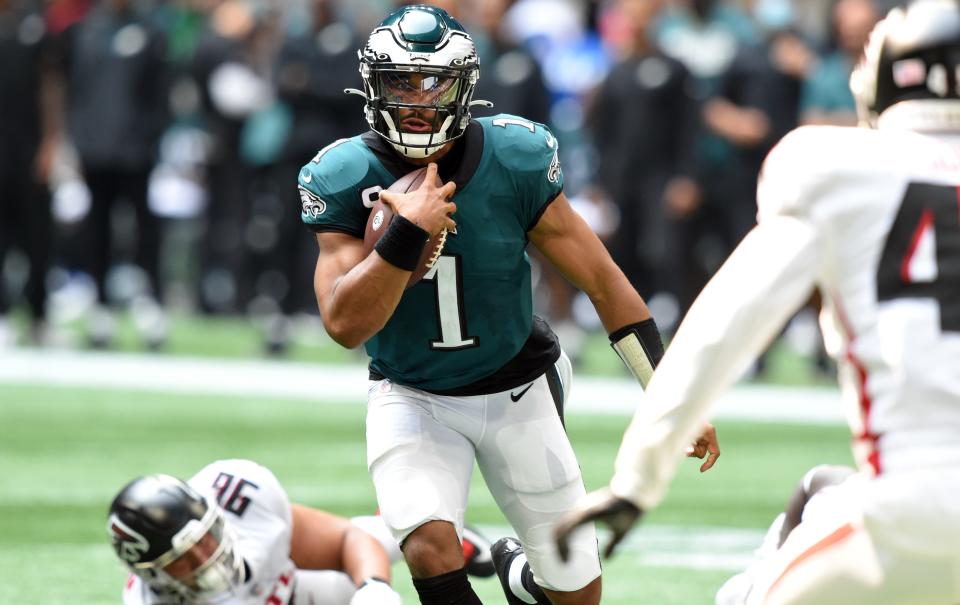 Sep 12, 2021; Atlanta, Georgia, USA; Philadelphia Eagles quarterback Jalen Hurts (1) scrambles up the field against the Philadelphia Eagles during the second half at Mercedes-Benz Stadium. Mandatory Credit: John David Mercer-USA TODAY Sports