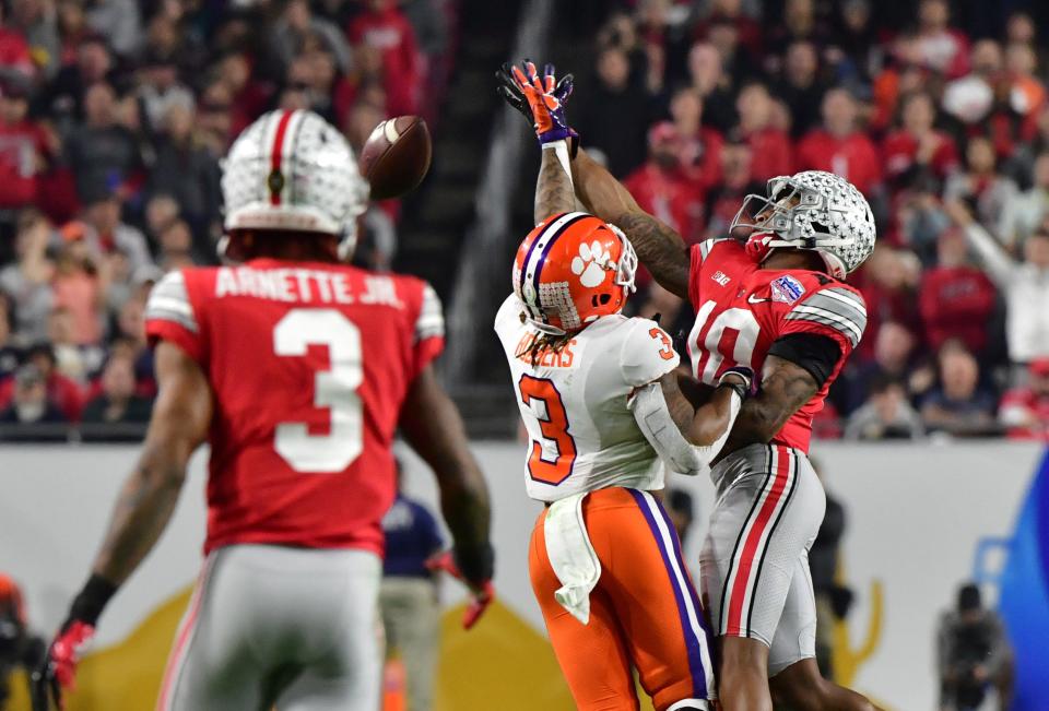 Dec 28, 2019; Glendale, AZ, USA; Clemson Tigers wide receiver Amari Rodgers (3) cannot catch a pass against Ohio State Buckeyes cornerback Amir Riep (10) during the third quarter in the 2019 Fiesta Bowl college football playoff semifinal game at State Farm Stadium. Mandatory Credit: Matt Kartozian-USA TODAY Sports