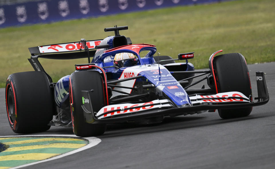 Team RB driver Daniel Ricciardo of Australia drives through the Senna corner during the qualifying session at the Formula 1 Canadian Grand Prix auto race , Saturday, June 8, 2024. (Graham Hughes/The Canadian Press via AP)