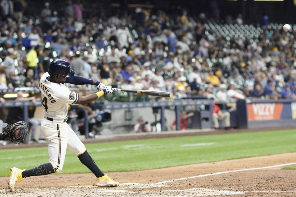 Milwaukee Brewers' Andruw Monasterio hits a double during the seventh inning of a baseball game against the Pittsburgh Pirates Thursday, Aug. 3, 2023, in Milwaukee. (AP Photo/Morry Gash)