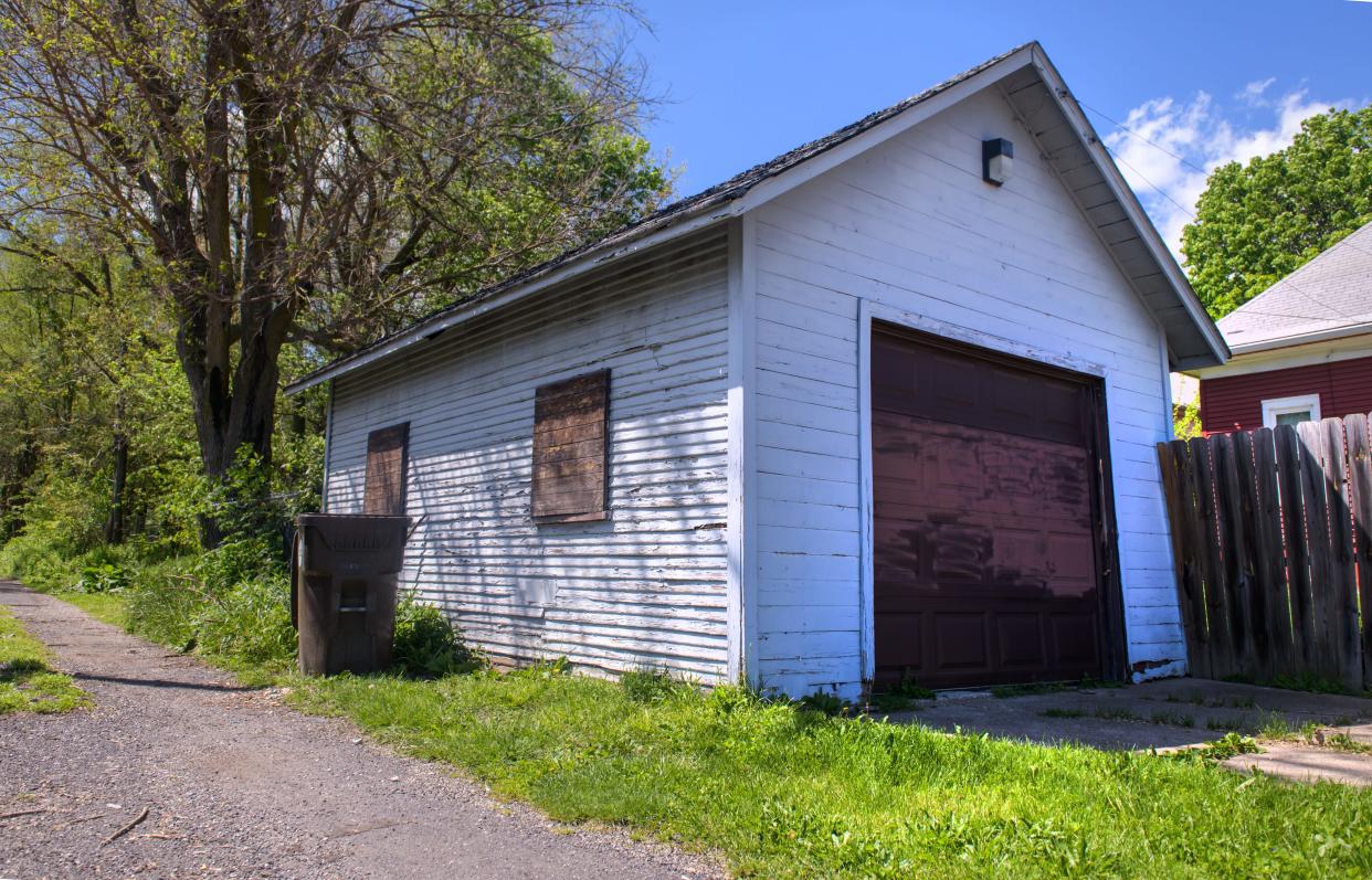 A dilapidated old garage sits in Peoria's East Bluff neighborhood.