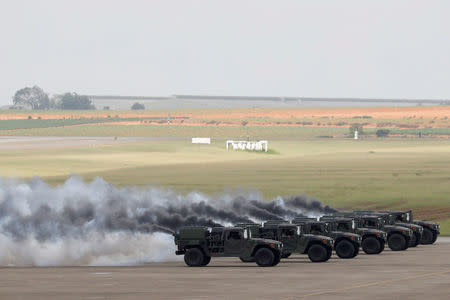 M56 coyote smoke generator vehicles take part in Han Kuang military drill simulating the China's People's Liberation Army (PLA) invading the island, at Ching Chuan Kang Air Base, in Taichung, Taiwan June 7, 2018. REUTERS/Tyrone Siu