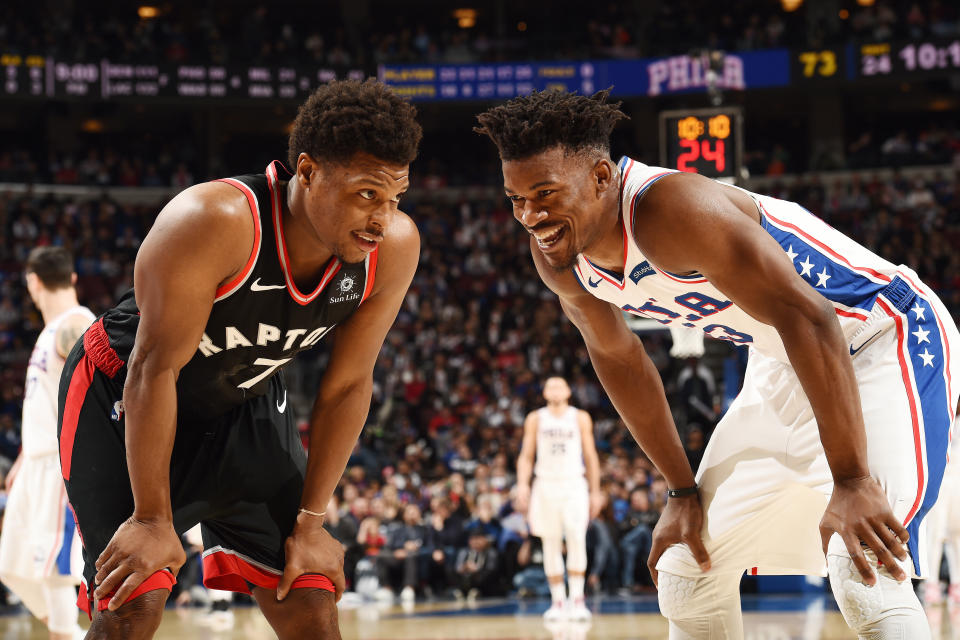 PHILADELPHIA, PA - DECEMBER 22:  Kyle Lowry #7 of the Toronto Raptors and Jimmy Butler #23 of the Philadelphia 76ers defend their positions during the game on December 22, 2018 at the Wells Fargo Center in Philadelphia, Pennsylvania NOTE TO USER: User expressly acknowledges and agrees that, by downloading and/or using this Photograph, user is consenting to the terms and conditions of the Getty Images License Agreement. Mandatory Copyright Notice: Copyright 2018 NBAE (Photo by David Dow/NBAE via Getty Images)