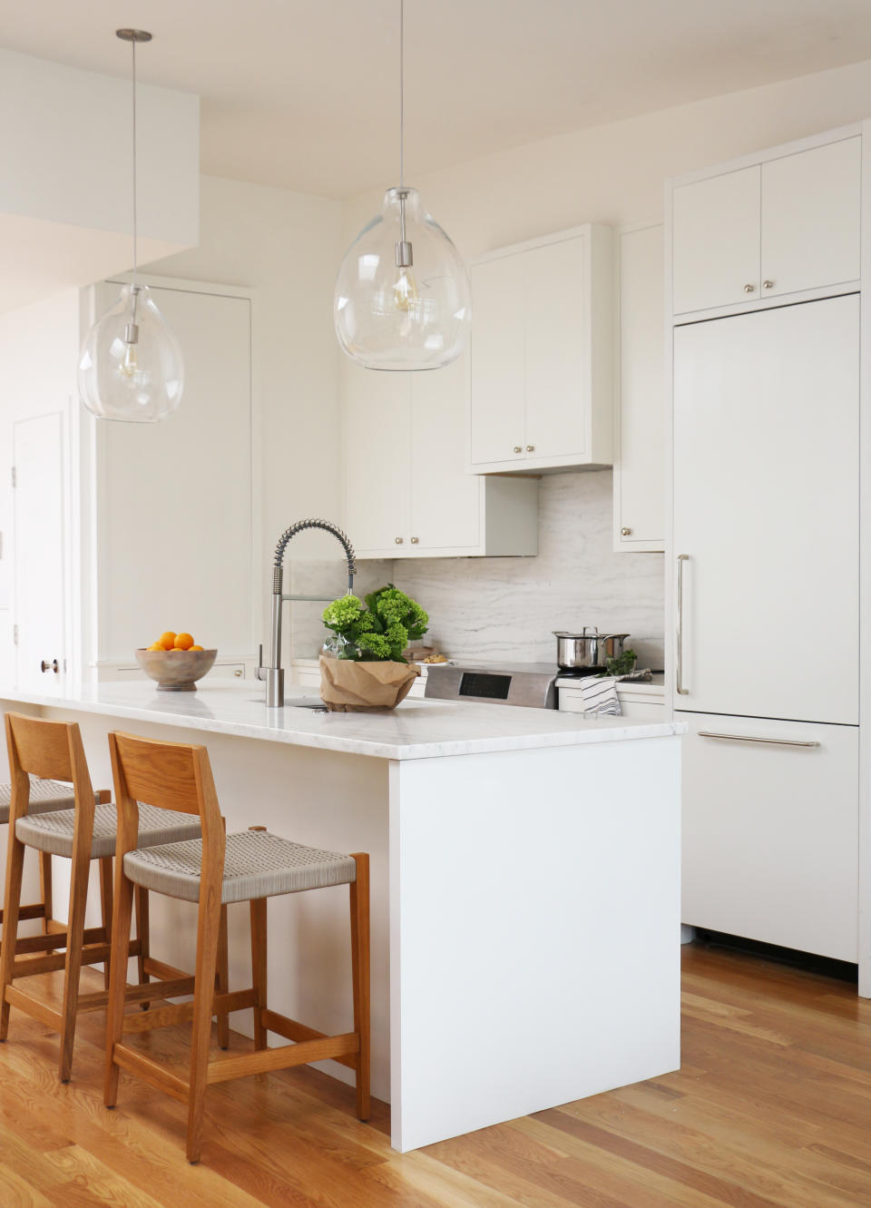 Small white kitchen with island