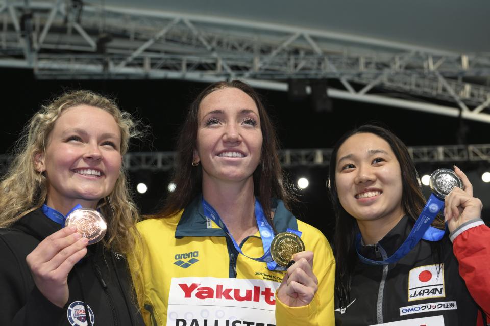 From left, Kensey McMahon of the United States, Lani Pallister of Australia and Miyu Namba of Japan display their medals from the women's 1500-meter freestyle final during the world swimming short course championships.