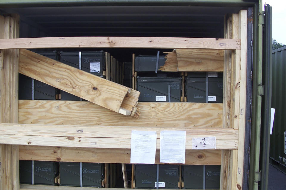 In this July 13, 2017 photo released by the U.S. Army Criminal Investigation Command on Feb. 9, 2021, a storage container of explosive ordnance shows signs of theft after arriving at the Letterkenny Army Depot in Chambersburg, Pa. An ammunition canister containing 32 rounds of 40mm M430A1 grenades, property of the U.S. Marine Corps, was missing. (U.S. Army Criminal Investigation Command via AP)