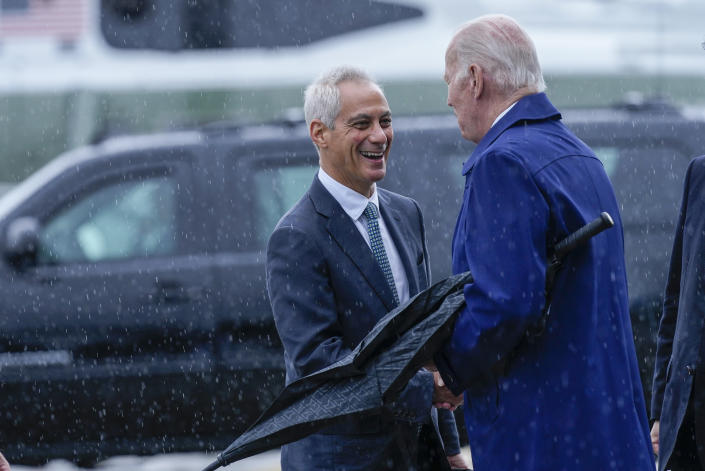 President Joe Biden, right, is greeted by Rahm Emanuel, the United States Ambassador to Japan on his arrival at Marine Corps Air Station Iwakuni in Iwakuni, Japan, Thursday, May 18, 2023. Biden is traveling to attend the G-7 Summit in Hiroshima, Japan. (AP Photo/Susan Walsh)