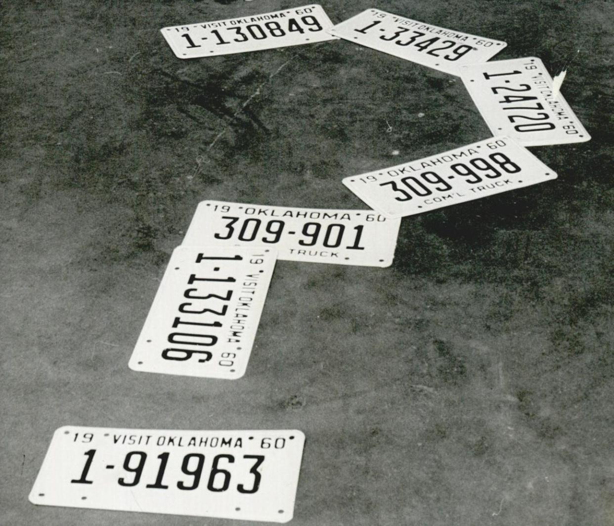 Inquisitive about license plates? A journalist in 1923 reported only three out of 10 motorists could recite their tag numbers from memory. In this 1960 photograph, auto tags were used to create a question mark after an Oklahoma County tag agent discovered there were seven duplicated tags among 160,000 license plates made for Oklahoma County by prisoners.