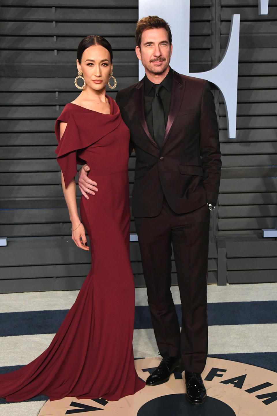 <p>The <em>Designated Survivor</em> star and her actor fiancé both made the case for deep reds. (Photo: Jon Kopaloff/WireImage) </p>