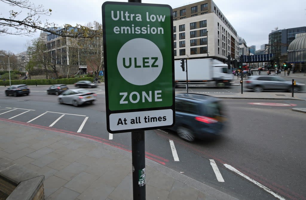 An Ultra Low Emission Zone information sign at Tower Hill in central London (PA) (PA Archive)