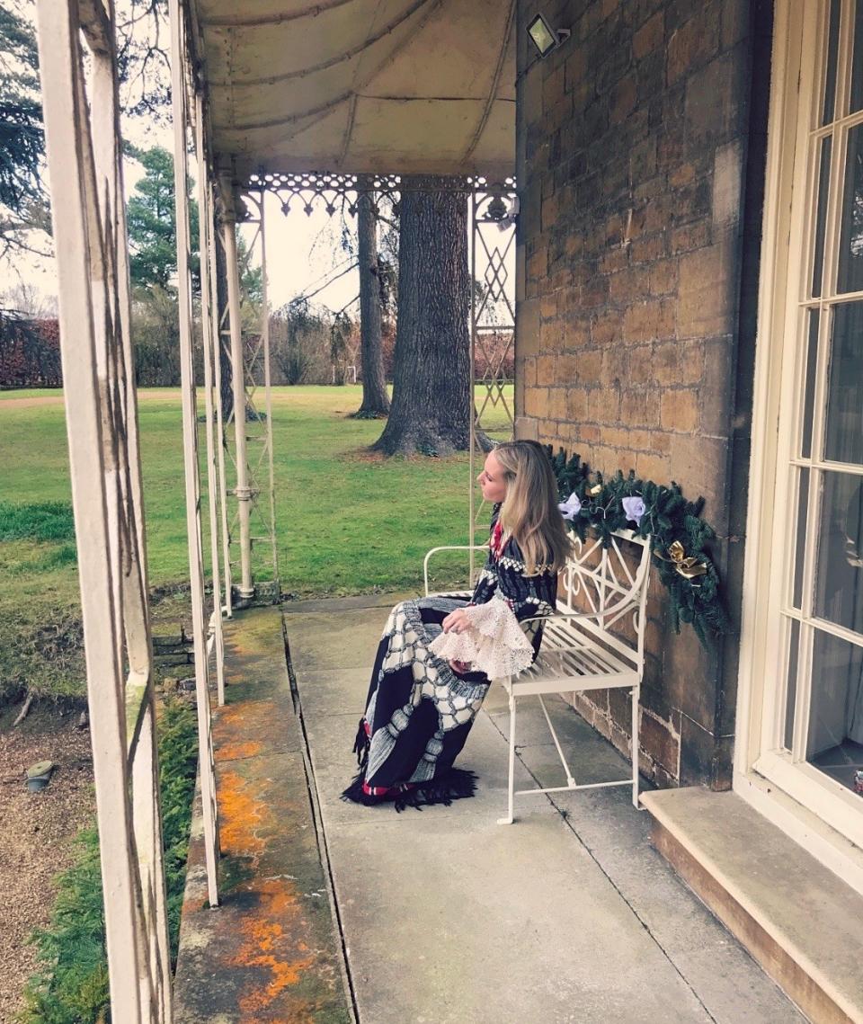 Sitting on our porch in my fave Gucci frock wondering if I’ve been good this year.