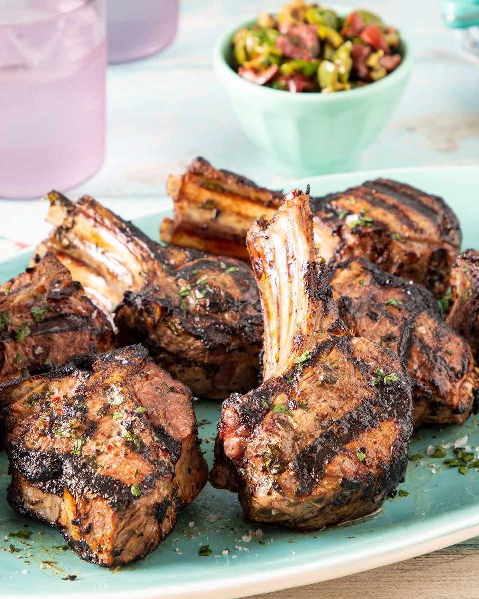 <p>Add these garlic-and-herb marinated lamb chops to your list of grilling recipes for the ultimate backyard cookout. Top them with marinated olives and serve with your favorite potato salad.</p><p>Get the Grilled Lamb Chops recipe from <a href="https://www.thepioneerwoman.com/food-cooking/recipes/a39589683/grilled-lamb-chops-recipe/" rel="nofollow noopener" target="_blank" data-ylk="slk:The Pioneer Woman;elm:context_link;itc:0;sec:content-canvas" class="link "><strong>The Pioneer Woman</strong></a>. </p>