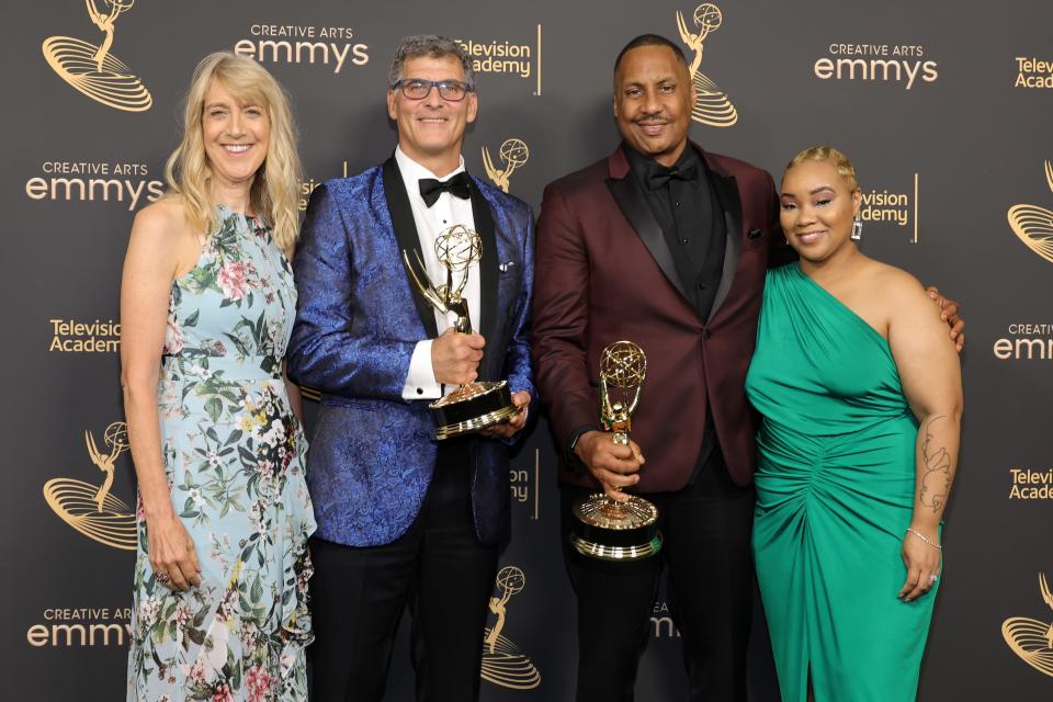 Lois Vossen (from left), Brad Lichtenstein, Claudiare Motley and Santana Coleman pose at the Creative Arts Emmys in Los Angeles on Sept. 3, 2022, after "When Claude Got Shot" received the award for exceptional merit in documentary filmmaking. The documentary follows Motley's experiences with the justice system after he was shot while visiting his Milwaukee hometown. Vossen, executive producer, and Lichtenstein, a Milwaukee filmmaker who directed the movie, received trophies. Coleman was co-producer on "When Claude Got Shot."