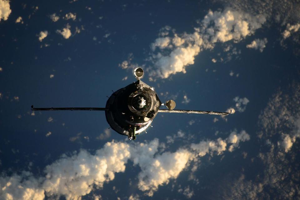 Soyuz flying though space (via REUTERS)