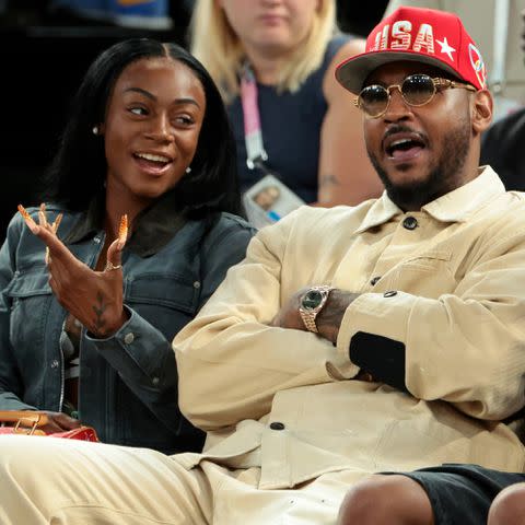 <p>Jean Catuffe/Getty</p> Sha'Carri Richardson and Carmelo Anthony