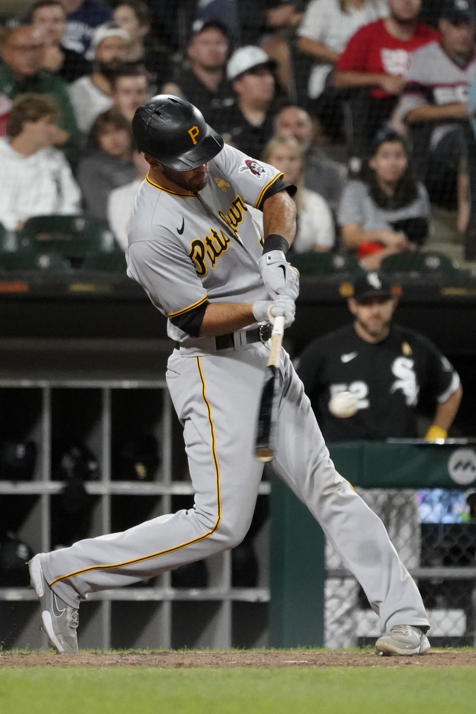 Pittsburgh Pirates' Jacob Stallings hits an RBI single off Chicago White Sox relief pitcher Liam Hendriks during the eighth inning of a baseball game Wednesday, Sept. 1, 2021, in Chicago. (AP Photo/Charles Rex Arbogast)