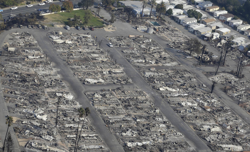 The fires have so far destroyed more than 3,500 homes – and they’re still going. (AP Photo/Jeff Chiu)