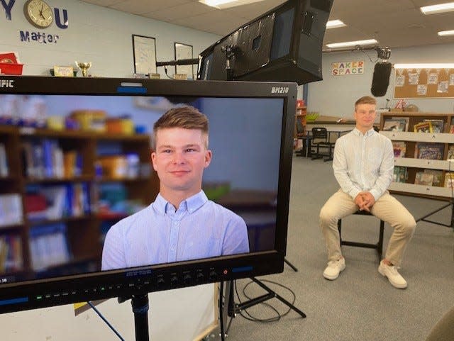 Andrew Schuhwerk, 22, a former student of Ken Abbott, is interviewed for the "Good Morning America" TV program. He just graduated from Alfred University in New York.