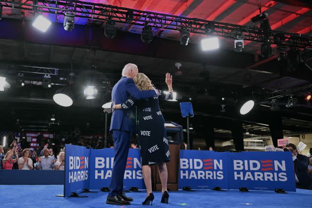 President Joe Biden and first lady Jill Biden walk off the stage Friday after a campaign event in Raleigh, North Carolina.