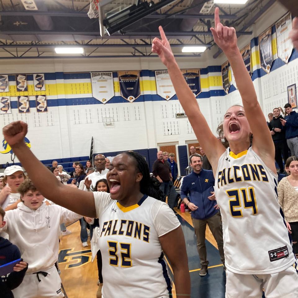 Jefferson seniors Amanda Nwankwo and Bryn Fitzgerald celebrate after defeating Pequannock to win their second straight NJSIAA North 1, Group 2 girls basketball title.