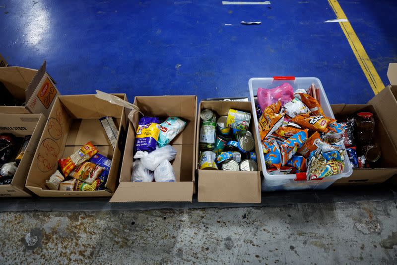 Boxes with donated humanitarian supplies are seen at a logistical centre to support those impacted by the deadly infiltration by Hamas gunmen from the Gaza Strip, in Tel Aviv