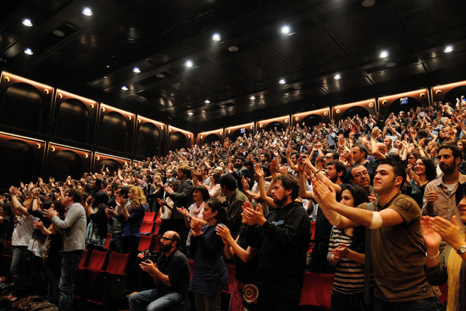 An entire room of applause. Credit: Discover Magazine