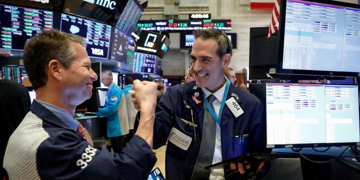 trader nyse celebrate happy fist bump