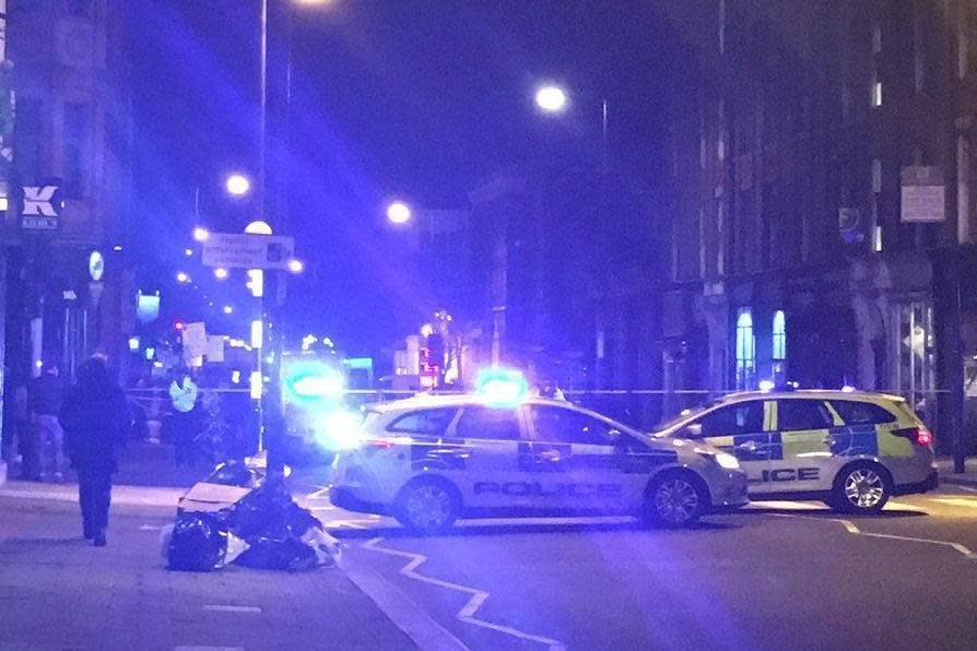 Police at the scene in Upper Street (N.Sky)