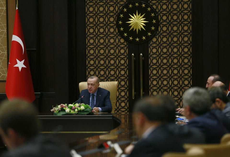 Turkey's President Recep Tayyip Erdogan, speaks at a meeting aimed at reviewing steps to advance Turkey's membership bid that coincided with Europe Day, in Ankara, Turkey, Thursday, May 9, 2019. Erdogan says Turkey is "stubbornly" pressing ahead with efforts to join the European Union despite circles in Europe trying to exclude his country from "the European family." He said the EU needed Turkey more than his country needs the 28-member bloc.(Presidential Press Service via AP, Pool)