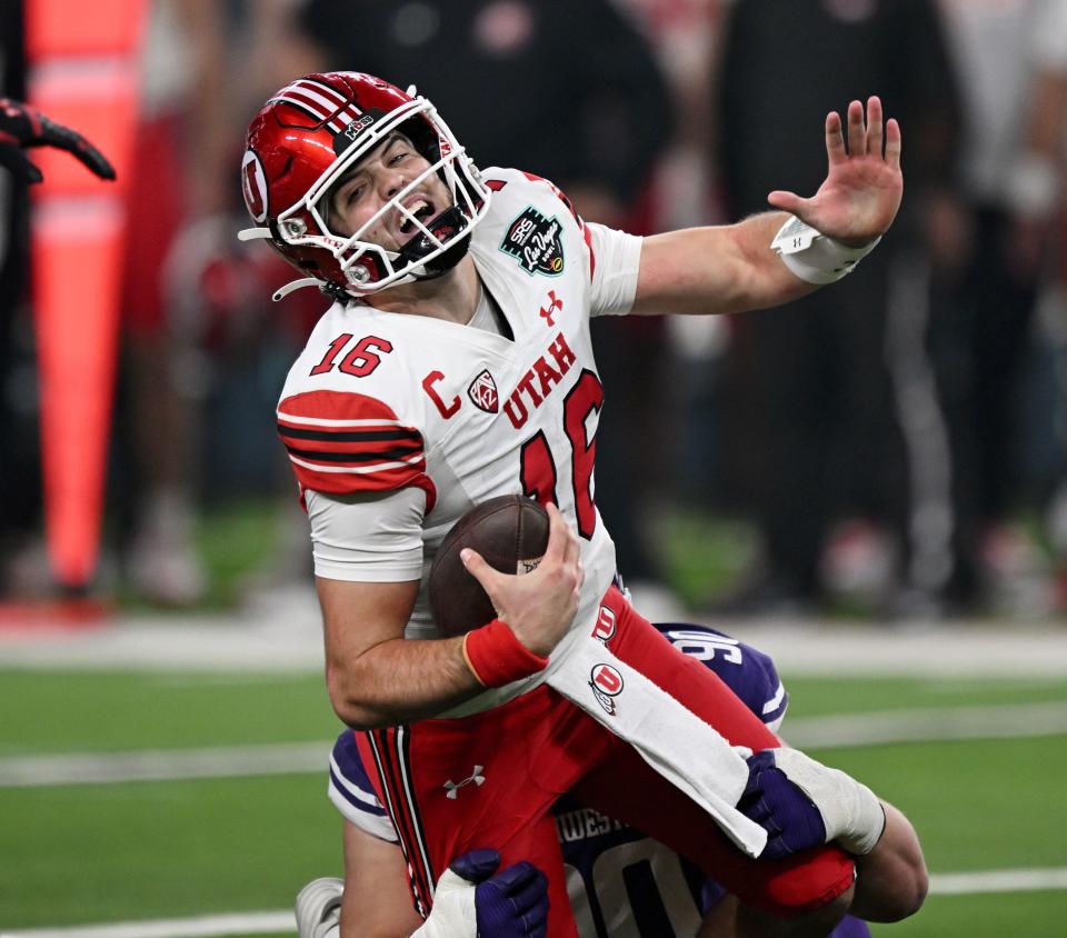 Utah Utes quarterback Bryson Barnes (16) is sacked by Northwestern Wildcats defensive lineman Carmine Bastone (90) as Utah and Northwestern play in the SRS Distribution Las Vegas Bowl at Allegiant Stadium on Saturday, Dec. 23, 2023. Northwestern won 14-7.