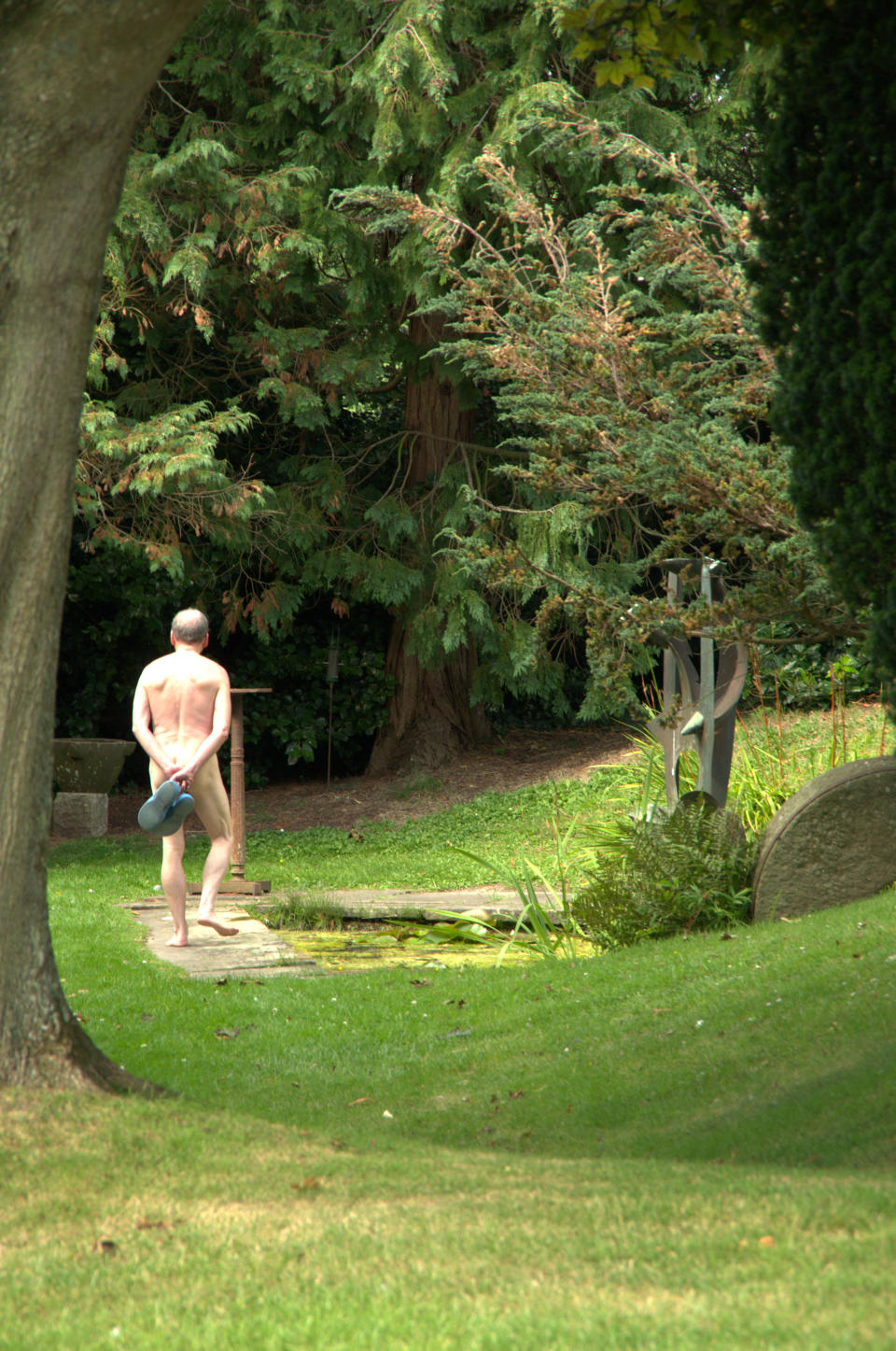 Phil walking through Farley’s Farm Sculpture Garden (Collect/PA Real Life)