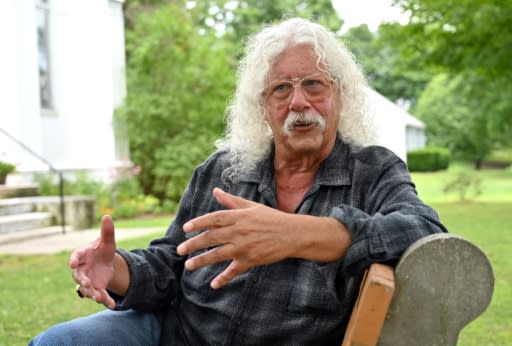 American singer-songwriter Arlo Guthrie was among the 32 acts to play Woodstock in 1969