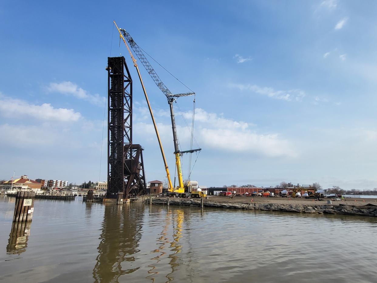 Demolition is underway early Tuesday, March 21, 2023, of the Pere Marquette Rail Bridge. Officials with the Port Huron Yacht Club, which owns the property, have said they expected the demo process to continue through the end of April.