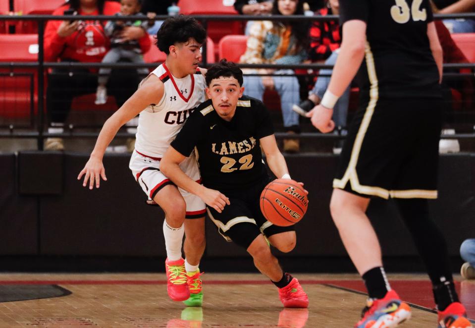 Lamesa's Pedro Barrioz (22) dribbles the ball against Brownfield in a District 3-3A basketball game, Friday, Jan. 6, 2023, at Brownfield High School in Brownfield.