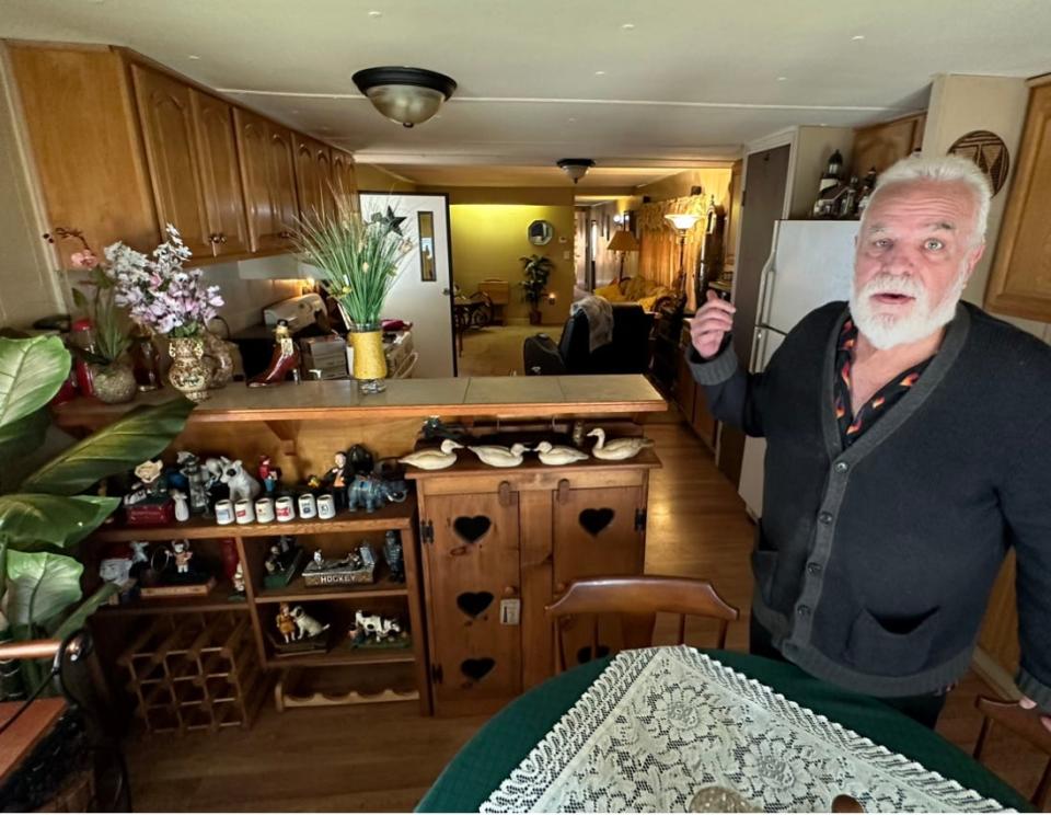 Roland L'Heureux in his mobile home in Lincoln – the least expensive year-round home in move-in shape now for sale in Rhode Island.