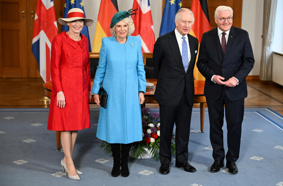 Elke Budenbender and Federal President Frank-Walter Steinmeier with King Charles III and Camilla Queen Consort as they sign the Golden Book, in Berlin, Germany - 29 Mar 2023    Tim Rooke/Pool via REUTERS