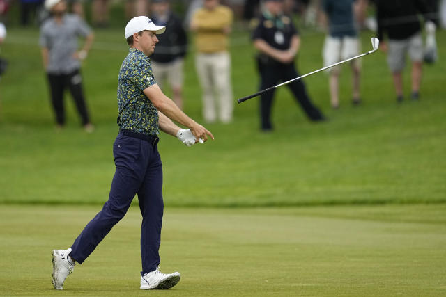Jordan Spieth tosses his club in the fairway on the seventh hole during the second round of the PGA Championship golf tournament at Oak Hill Country Club on Friday, May 19, 2023, in Pittsford, N.Y. (AP Photo/Abbie Parr)