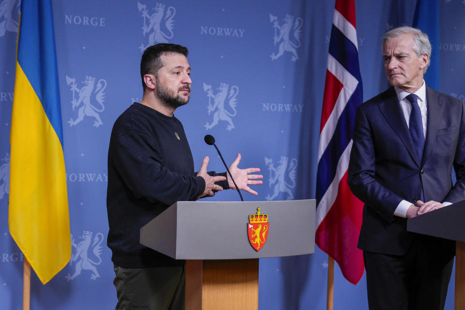 Ukrainian President Volodymyr Zelenskyy, left, and Norway's Prime Minister Jonas Gahr Støre attend a press conference at the government's representative residence in Oslo, Wednesday, Dec. 13, 2023. (Javad Parsa/NTB Scanpix via AP)